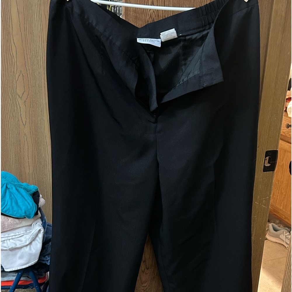 Women’s dress pants. Black dress pants. Never worn.